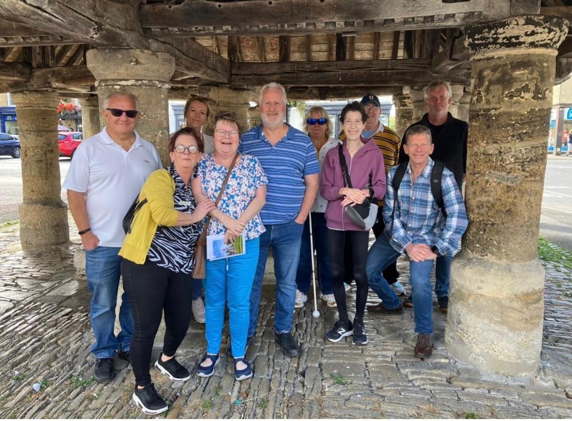 A group of people stand ready for a walk